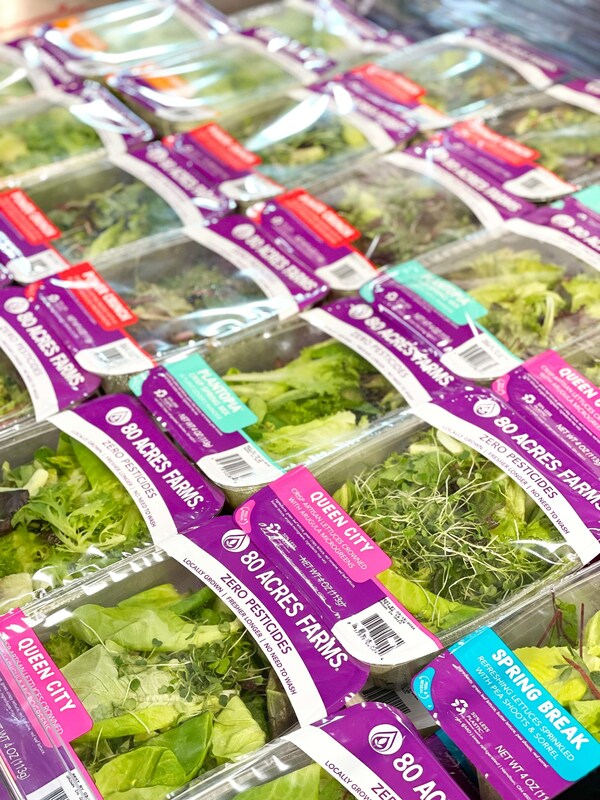 Packages of 80 Acres Farms lettuce